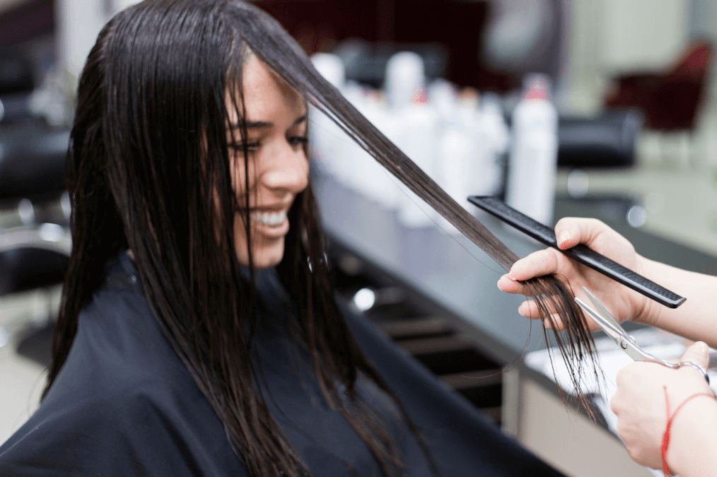 Woman in a Hair Salon Stock e1749133322994